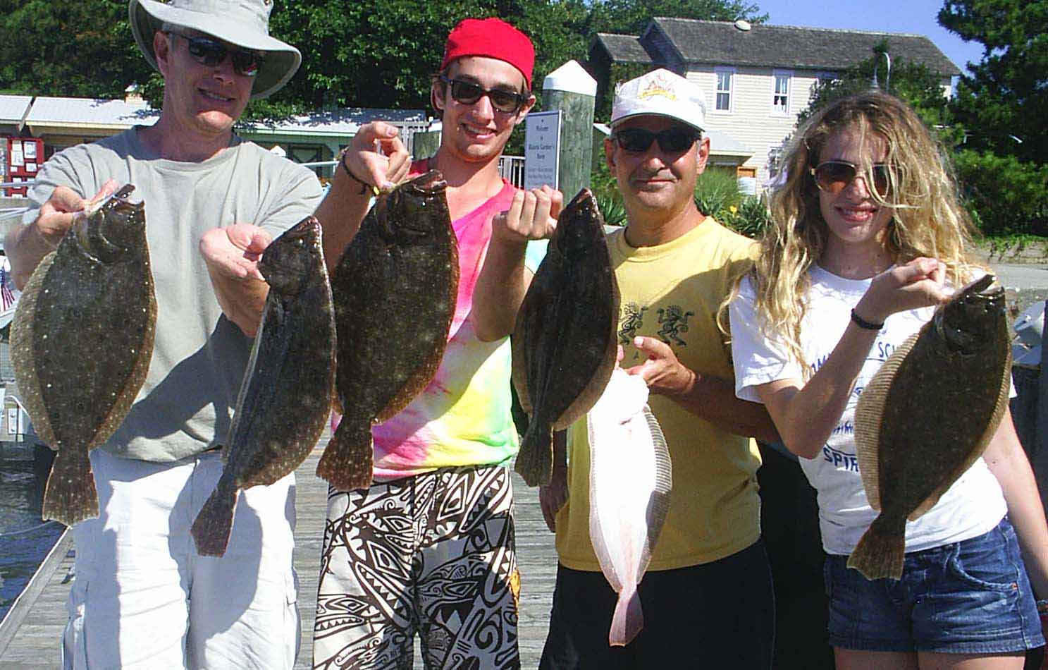 Catch lots of flounder on Time Out Charters
